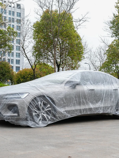 Disposable-Transparent-Car-Clothing-Cover-Dustproof-Rainproof-Transparent-Paint-Dustproof-Plastic-PE-Film-Rainproof-Car-Cover